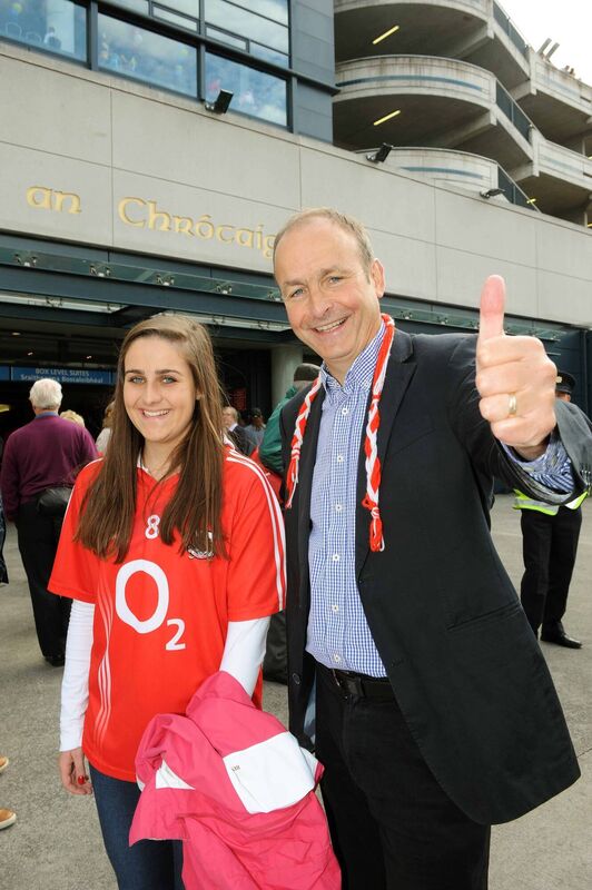 Micheál Martin, leader of the FF party and his daughter Aoibhe at the All-Ireland hurling final between Cork and Clare at Croke Park, Sept. 8, 2013. /Pic: Brian Lougheed
