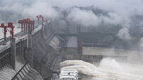 Floods kill 14 in China as water peaks at Three Gorges Dam