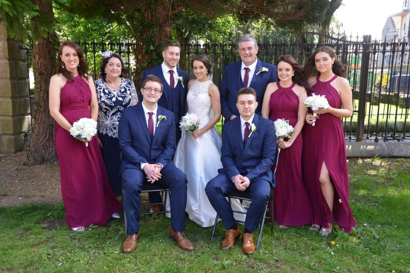 The happy couple with their bridal party. The happy couple with their bridal party.