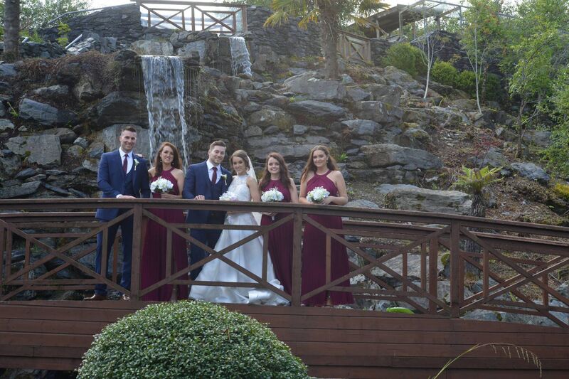 With their bridal party. With their bridal party.