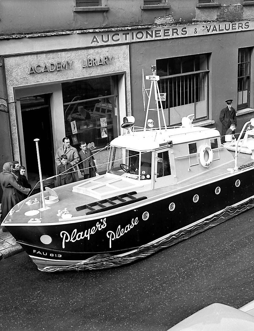 The Players Please float which appeared in the St Patrick's Day parade pictured at Academy Street, Cork in 1956.
