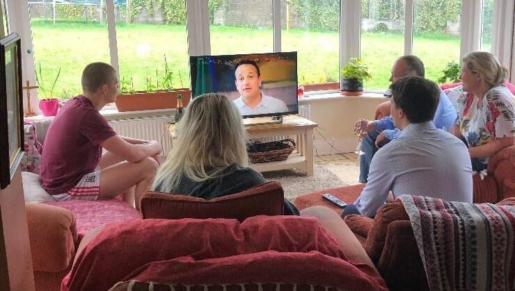 Colm Hannon watching the Taoiseach's address with family at home. Colm Hannon watching the Taoiseach's address with family at home.