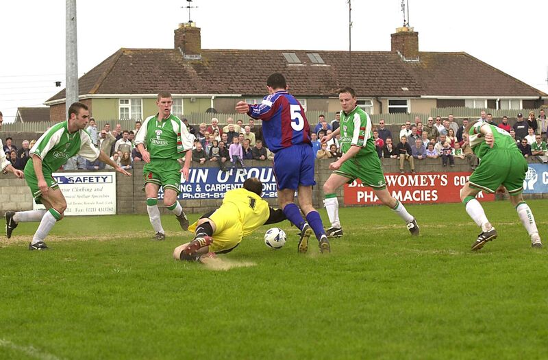 Cork City keeper Noel Mooney makes a brave save at the feet of Cobh Ramblers' Michael Brosnan. Picture: Brian Lougheed