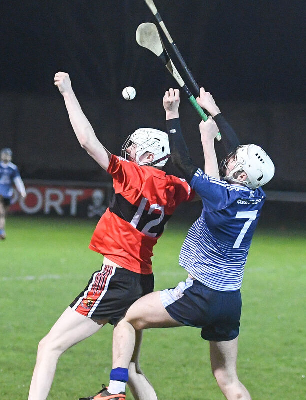 UCC's Paul Cooney and GMIT's Darach Fahy, battle for possession. Picture: David Keane.