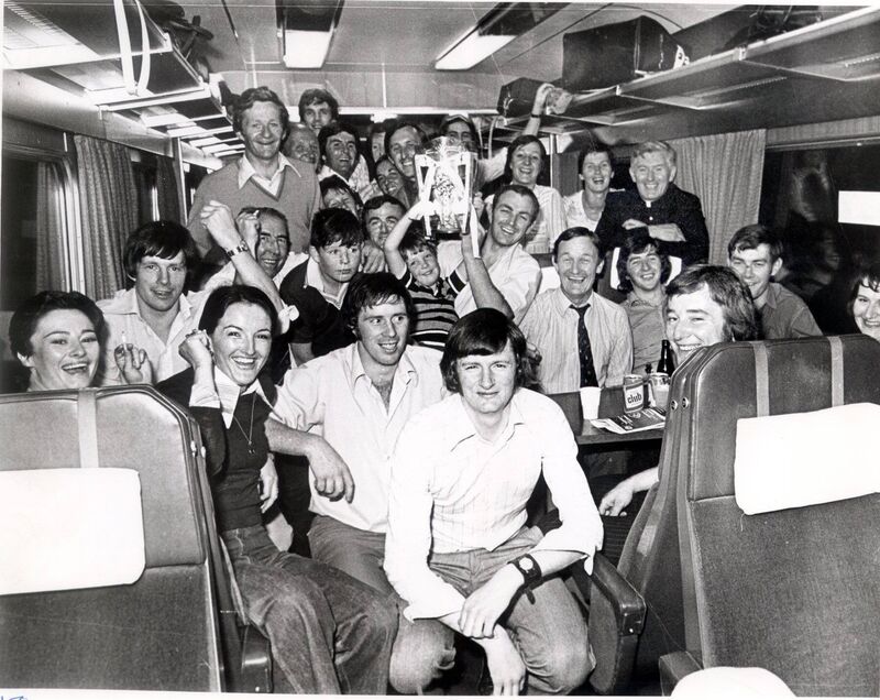 The 1976 Cork All-Ireland winning team party in jubilant mood on the train, including Pat McDonnell and Ray Cummins, county champions with UCC in 1970.