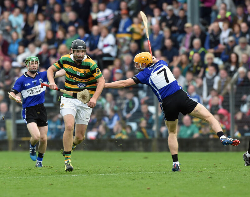 Glen Rovers' Dean Brosnan bursts past Sarsfields' Eanna Martin. Picture: Eddie O'Hare Glen Rovers' Dean Brosnan bursts past Sarsfields' Eanna Martin. Picture: Eddie O'Hare