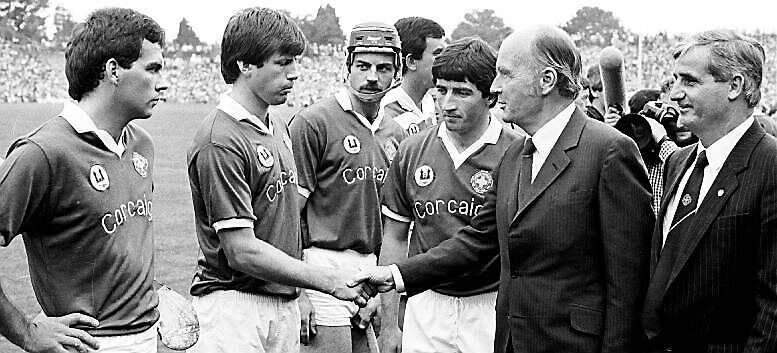 Cork captain John Fenton introduces President Patrick Hillery to Donal O’Grady before the Centenary All-Ireland Final at Semple Stadium, Thurles in 1984.