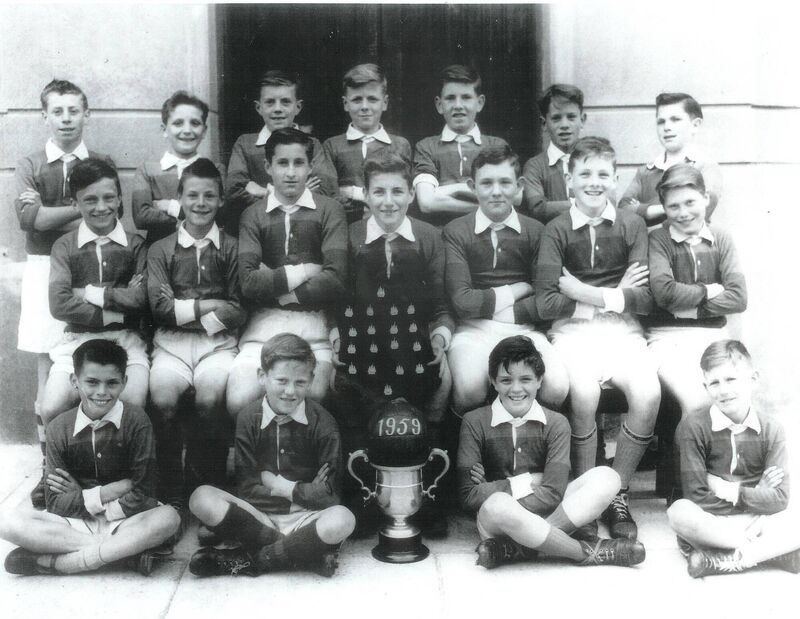 St Joseph’s Sciath na Scol winners 1959. Back: Tony McGeough, J Sheehan, J Blake, D McNamara, M McCarthy, T Coffey, J Wall. Middle: T Boyle, P O’Sullivan, l O’Brien, Finbarr O’Sullivan, M Moynihan, Donal Lyne, C Lang. Front: M Fowler, Barry McGann, Kieran Roddis, J Lambe. 