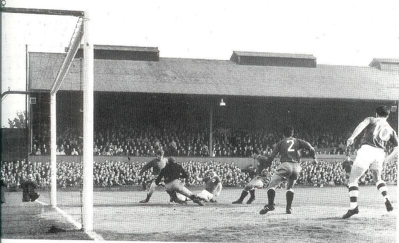 Noel Cantwell shoots narrowly wide against Spain in 1965