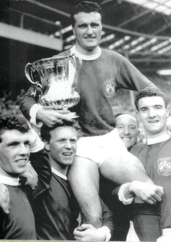 Man Utd skipper Noel Cantwell, holding the 1963 FA Cup, being shouldered around Wembley by Johnny Giles, Albert Quixall and Billy Foulkes.