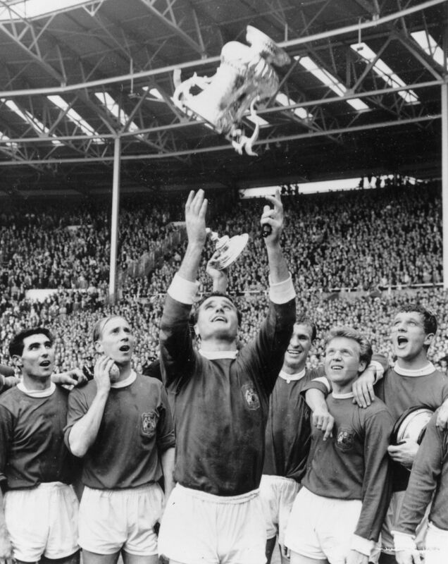 25th May 1963: Manchester United Captain Noel Cantwell and his team-mates celebrate their 3-1 win against Leicester City in the FA Cup at Wembley. Picture: Keystone/Getty Images