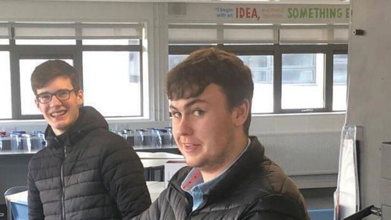 Two Cork students making face shields for frontline medics using school 3D printer