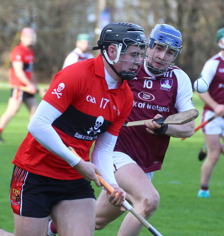Darragh Fitzgibbon of UCC and Cillian Lawless of NUI. Picture: Hany Marzouk