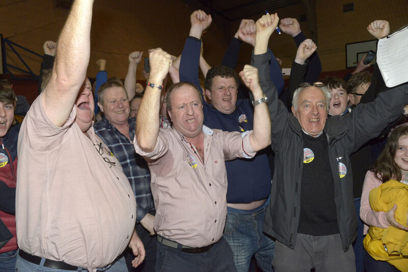 Michael Collins celebrates taking the first seat at the Cork South West count centre at Clonakilty. Picture Denis Boyle