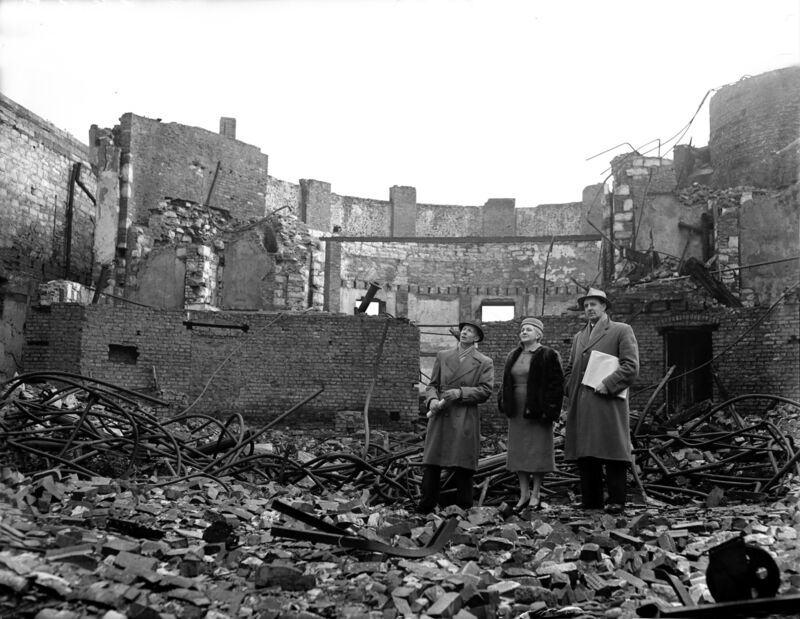 Please archive -Group of women standing in the ruins of the former Opera House after the fire. Please archive -Group of women standing in the ruins of the former Opera House after the fire.