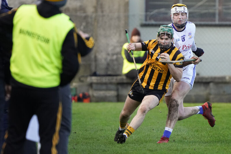Kevin O'Brien of Russell Rovers (Cork) breaks away from Einne O'Conghaile of Micheál Breathnach (Galway) in the 2020 AIB GAA Hurling All-Ireland Junior Club Championship Semi-Final in Kilmallock, Co Limerick on Sunday.Pic: Don Moloney