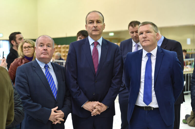 Cllr. Terry Shannon, Micheál Martin TD, Michael McGrath TD, at the count centre at Nemo Rangers GAA club, Cork. Picture Dan Linehan