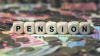 pension - cube with letters, money sector terms - sign with wooden cubes