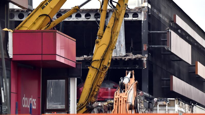 New images of fire-ravaged Douglas shopping centre show vehicle still inside 