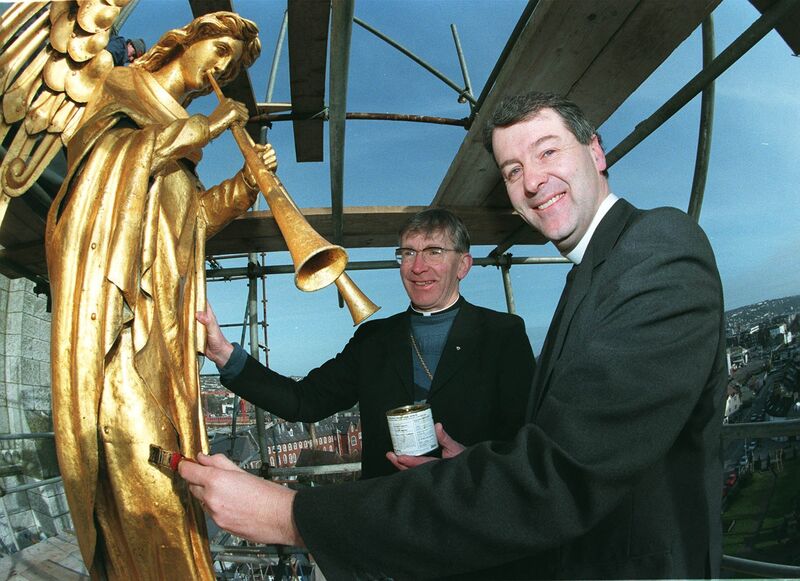 1999: Bishop of Cork & Ross Dr John Buckley and the Very Rev Dr Michael Jackson, Dean of Cork, on top of Saint Fin Barre's Cathedral checking the restoration of the golden angel. Picture: Mark Kelleher 1999: Bishop of Cork & Ross Dr John Buckley and the Very Rev Dr Michael Jackson, Dean of Cork, on top of Saint Fin Barre's Cathedral checking the restoration of the golden angel. Picture: Mark Kelleher