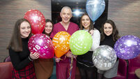 Cork quadruplets celebrate their 18th birthday with the doctors and midwives who delivered them