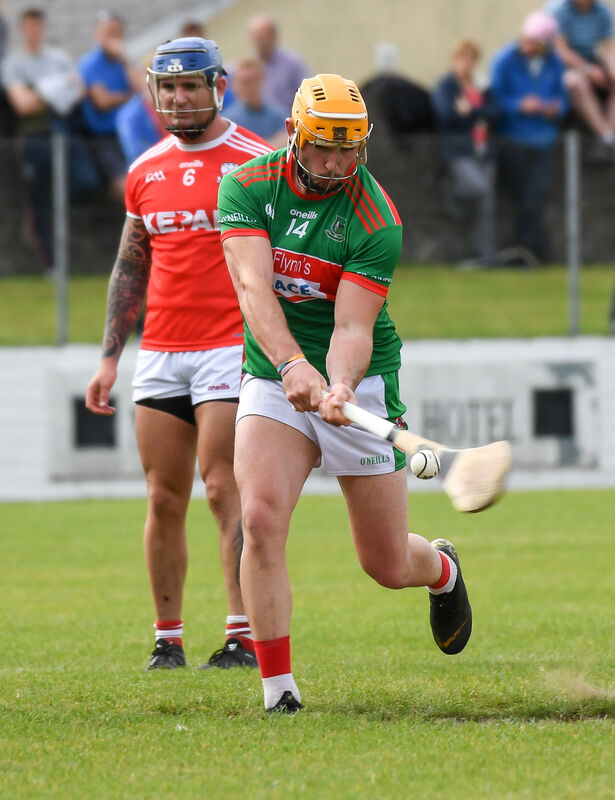 Fr O’Neill’s Declan Dalton crashes the ball to the Watergrasshill net from a penalty. Picture: David Keane. Fr O’Neill’s Declan Dalton crashes the ball to the Watergrasshill net from a penalty. Picture: David Keane.