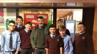 Roy Keane pops into his old school for Christmas 