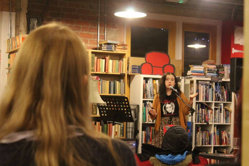 Shaunna Lee Lynch giving a reading.