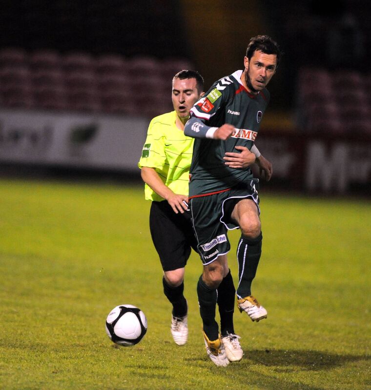 George O'Callaghan goes past Monaghan United's Barry Clancy. Picture: Eddie O'Hare