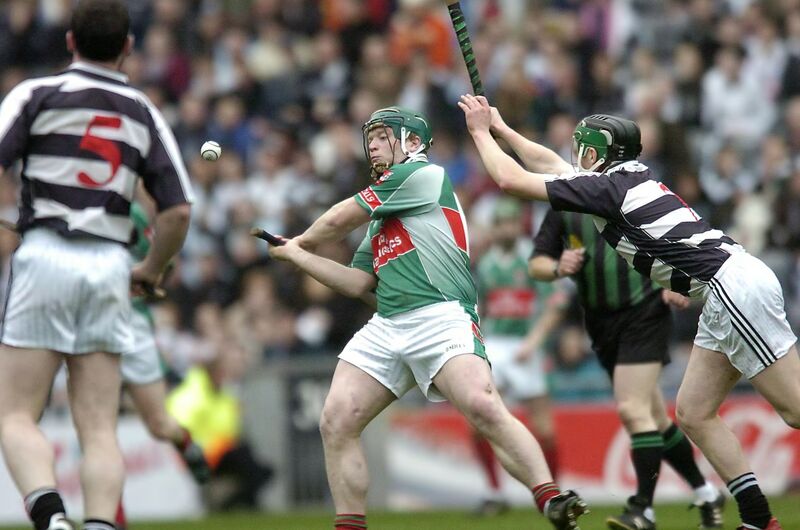 John Flavin, Fr O'Neill's knocking this ball over the bar from John Rogers, Erin's Own. Picture Dan Linehan