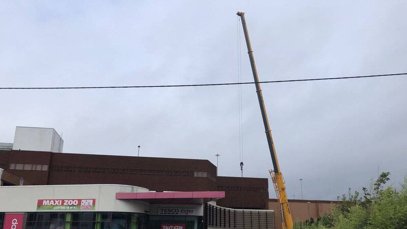 The first cars have been removed from the roof of the Douglas car park