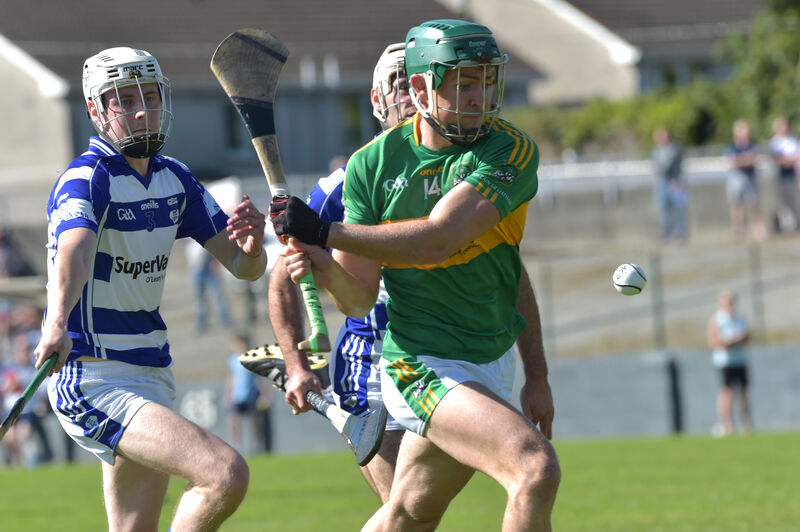 Anthony Spillane about to get the opening goal as he gets past Inniscarra players Brian O’Mahony and John O’Callaghan. Picture: Dan Linehan
