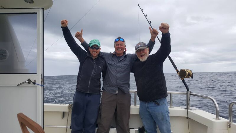 Darren O'Sullivan, Dave Edwards and Henk Veldman celebrate catching the huge fish. Darren O'Sullivan, Dave Edwards and Henk Veldman celebrate catching the huge fish.