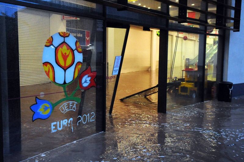 Water pouring into Douglas village shopping centre from the East side during the flood. Picture: Eddie O'Hare Water pouring into Douglas village shopping centre from the East side during the flood. Picture: Eddie O'Hare