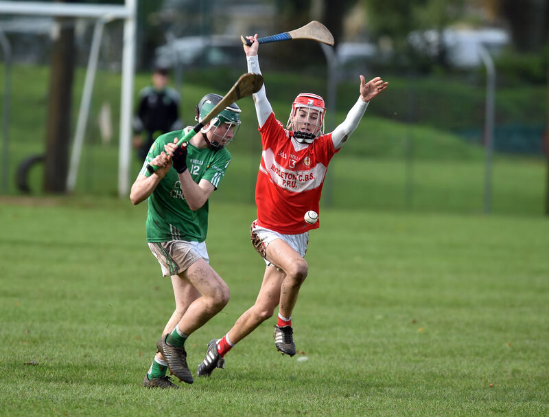 Colman's Michael O'Driscoll shoots from Midleton CBS' Tiernán Roche. Picture: Eddie O'Hare Colman's Michael O'Driscoll shoots from Midleton CBS' Tiernán Roche. Picture: Eddie O'Hare