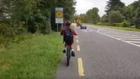 Father responds to Twitter criticism over video of child cycling to school