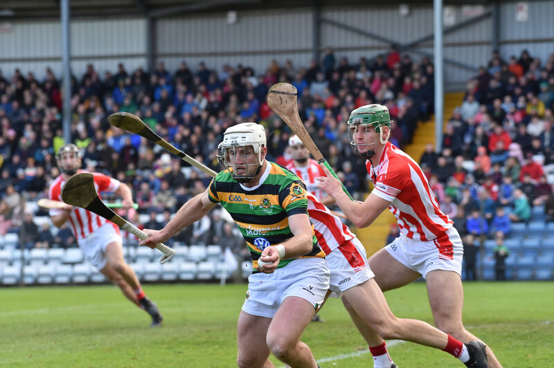 Patrick Horgan getting away from Imokilly players Ger Millerick and Colm Barry. Picture: Dan Linehan