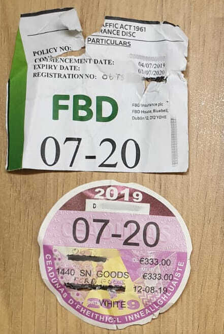 Tax and insurance discs with fake details scribbled in.Pic: Garda Facebook Page for the Southern Region.