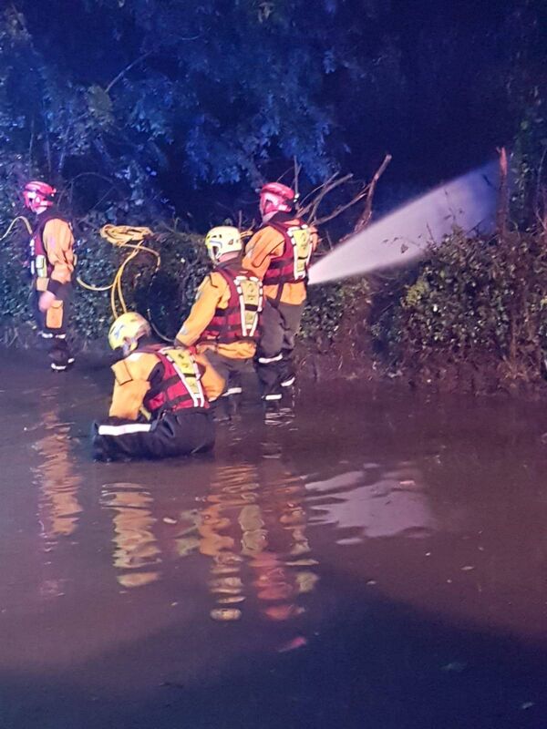 Cork City Fire Brigade working to relieve flooding across the city last night. Pic: Cork City Fire Brigade.