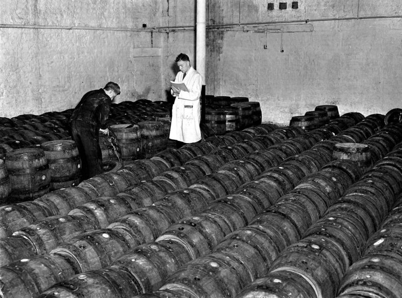 Staff members checking the barrels in 1953.