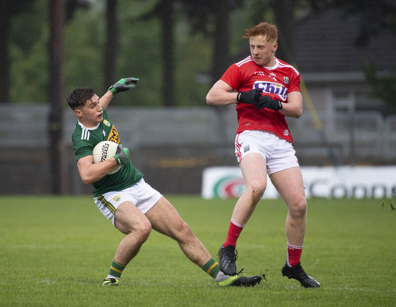 Kieran O’Sullivan is knocked off balance by Ryan O’Donovan. Picture: Dan Linehan