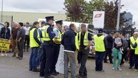 Traffic queues as farmers protest the price of beef at Cork factory