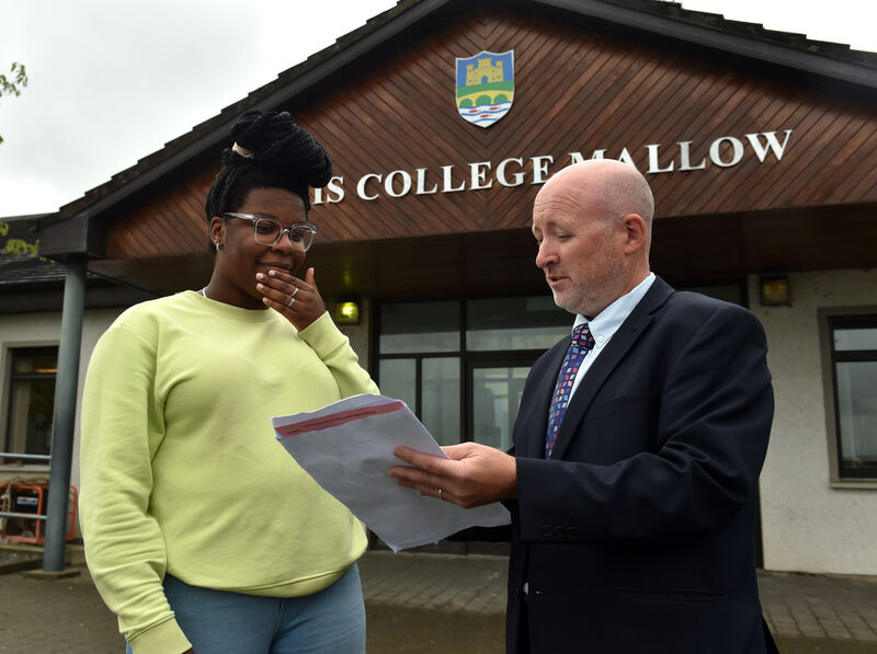 Stephen Gilbert, principal with Demi Isaac Oviawe, who plays Linda in the Young Offenders after collecting her leaving cert results from Davis College, Mallow. Demi has been appointed Culture Night Ambassador for County Cork this year. Culture Night takes place on September 20th. Picture: Eddie O'Hare