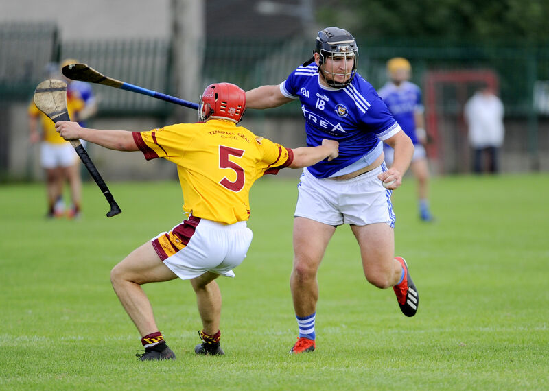 Whitechurch's Aidan Kelleher attempts to stop Brian Dillon's Cillian Brosnan. Picture: Gavin Browne