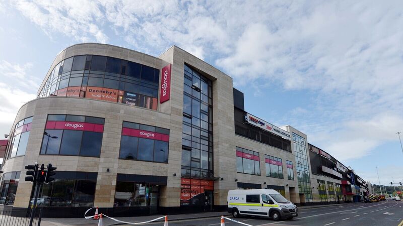 Traders fear Douglas Village Shopping Centre could be closed for weeks following devastating fire Traders fear Douglas Village Shopping Centre could be closed for weeks following devastating fire