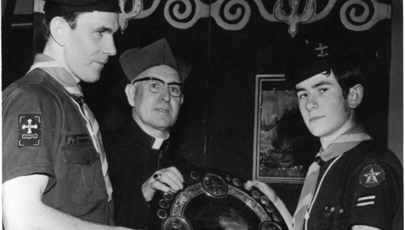 The late Bishop of Cork and Ross, Most Rev. Dr. Cornelius Lucey presenting the Cork Diocesan Shield in 1967 to Scout Master Brendan O’Sullivan and Patrol Leader Liam Hurley of the 12th Cork Troop (St. Patrick’s). Picture: Barrys Photographic The late Bishop of Cork and Ross, Most Rev. Dr. Cornelius Lucey presenting the Cork Diocesan Shield in 1967 to Scout Master Brendan O’Sullivan and Patrol Leader Liam Hurley of the 12th Cork Troop (St. Patrick’s). Picture: Barrys Photographic