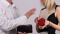 Paying while dating. Man does not allow woman to pay the bill. Dating etiquette