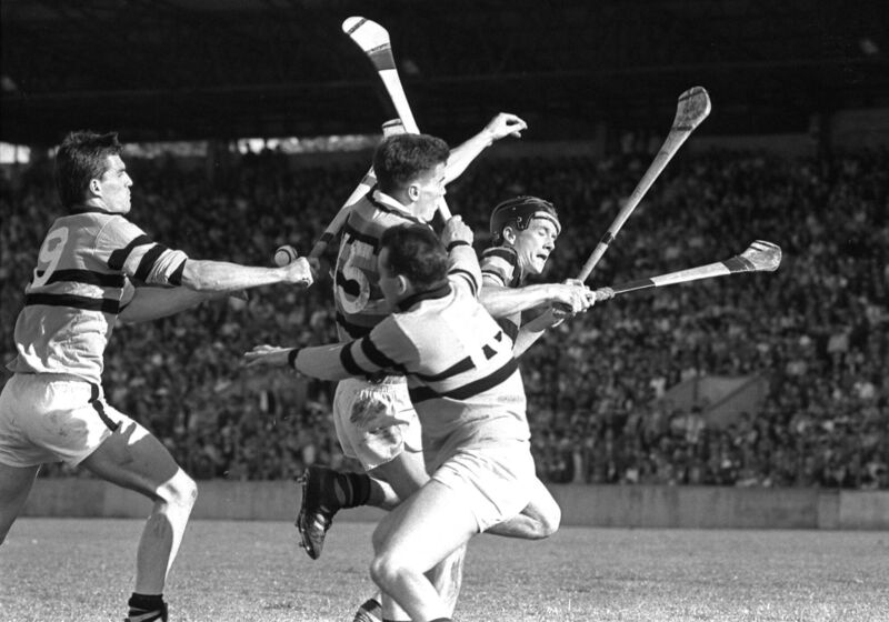 Paul O'Connor and Christy Donovan, Na Piarsaigh, battle with John Fitzgibbon and Robbie Murphy, Glen Rovers, in 1987. Paul O'Connor and Christy Donovan, Na Piarsaigh, battle with John Fitzgibbon and Robbie Murphy, Glen Rovers, in 1987.