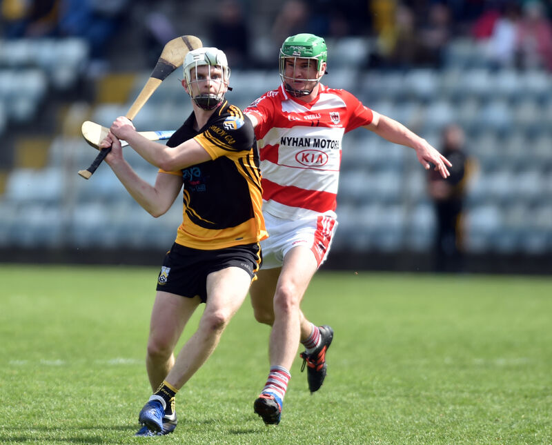 Fermoy's Padraig De Roiste shoots from Courcey Rovers' John McCarthy. Picture: Eddie O'Hare
