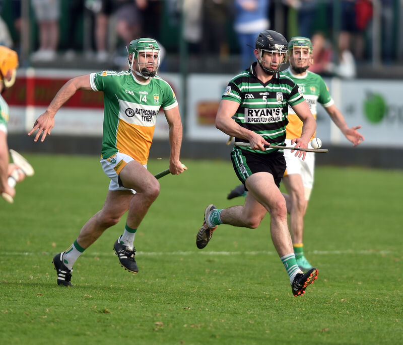Douglas' Conor Kingston racing away from Bride Rovers' Daniel Dooley. Picture: Eddie O'Hare Douglas' Conor Kingston racing away from Bride Rovers' Daniel Dooley. Picture: Eddie O'Hare